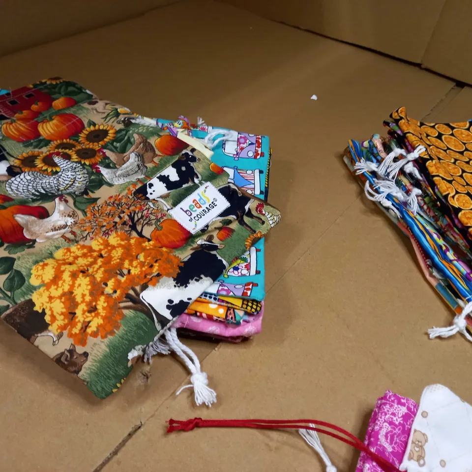 LOT OF APPROX 30 SEWN ASSORTED PATTERNS BEAD OF COURAGE WASH BAGS