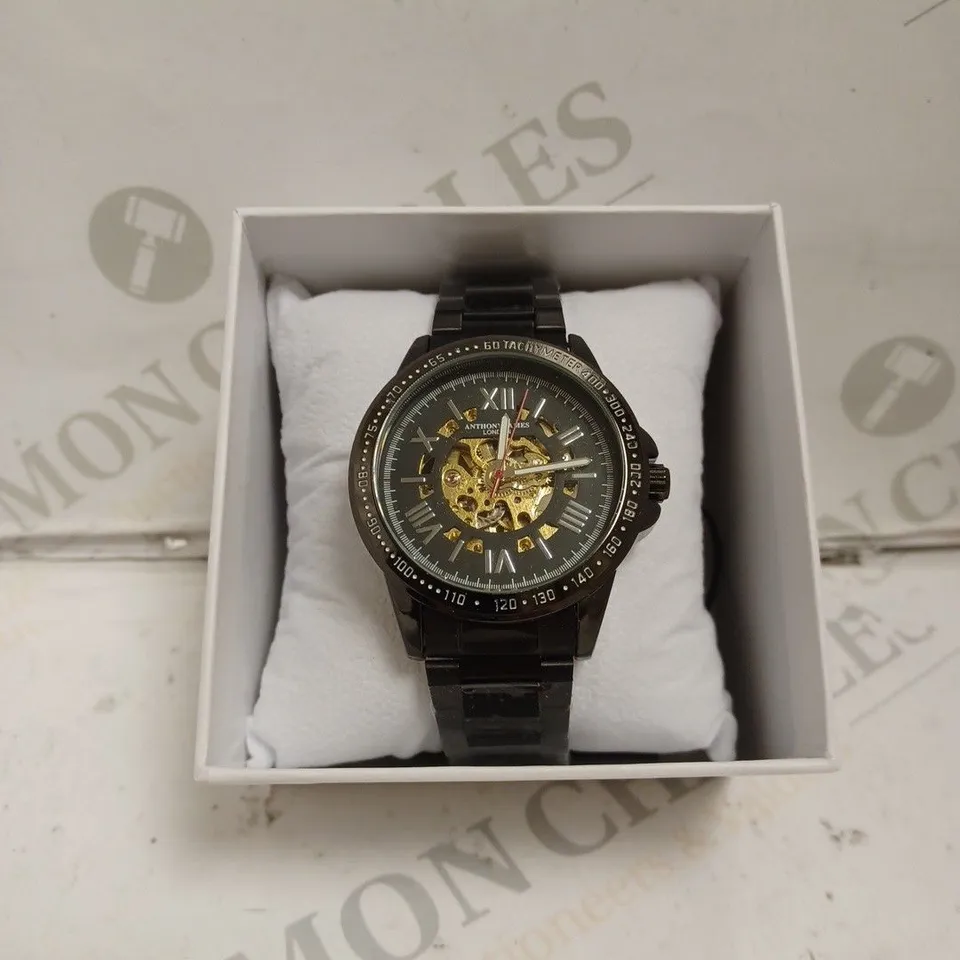BOXED ANTHONY JAMES WATCH - AUTOMATIC - WATER RESISTANT 3ATM - SKELETON FACE - STAINLESS STEEL BLACK. 