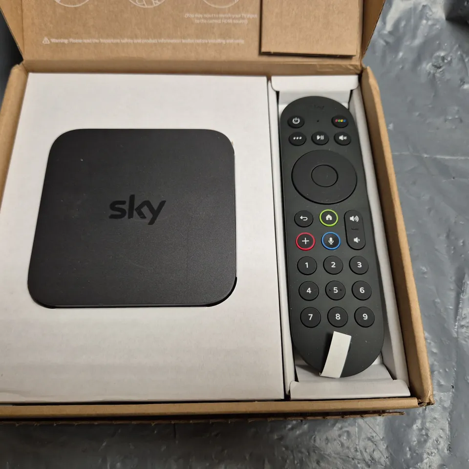 BOXED SKY MULTI ROOM STREAM PUCK MODEL IP061-EF-ANT BOX REMOTE AND CABLES
