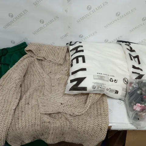 LARGE BOX OF ASSORTED CLOTHING ITEMS IN VARIOUS COLOURS AND SIZES INCLUDING TROUSERS , TOPS AND JUMPERS