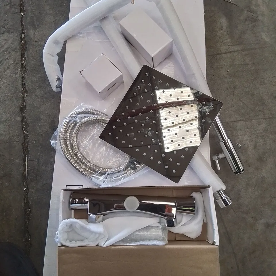 A BOXED THERMOSTATIC SHOWER WITH ADJUSTABLE SHOWER HEAD