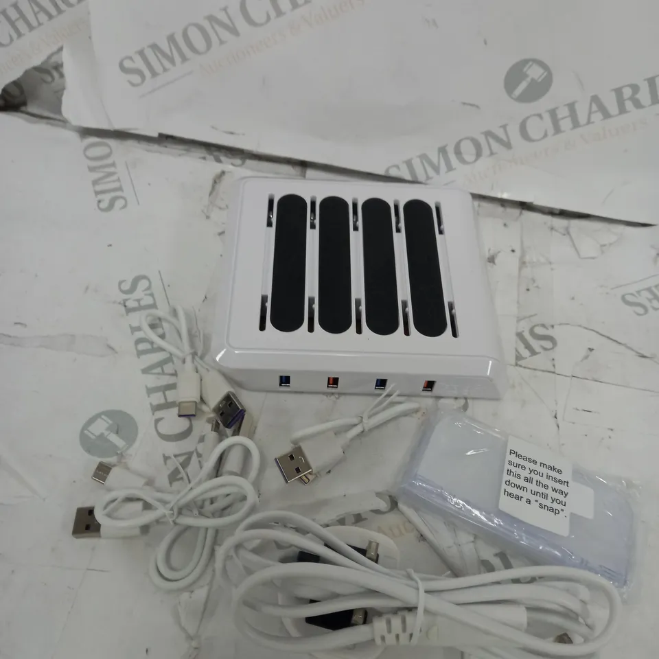 BELL & HOWELL MULTI DEVICE USB CHARGING STATION WITH 4 USB PORTS AND 4 CABLES