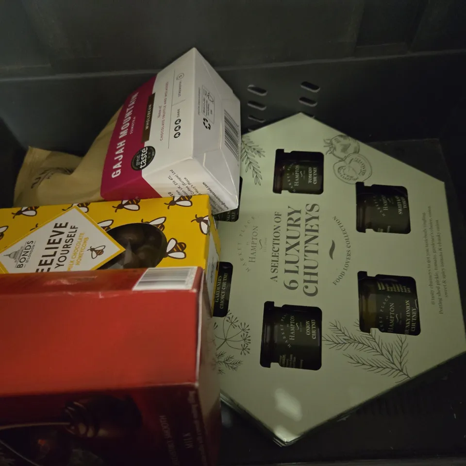 TOTE OF APPROXIMATELY 10 ASSORTED FOOD ITEMS TO INCLUDE - M&S CINNAMON SUGAR PALMIERS , ANNAS CAPPUCCINO THINS , TRIPLE CHOCOLATE CHUNK BISCUITS ETC