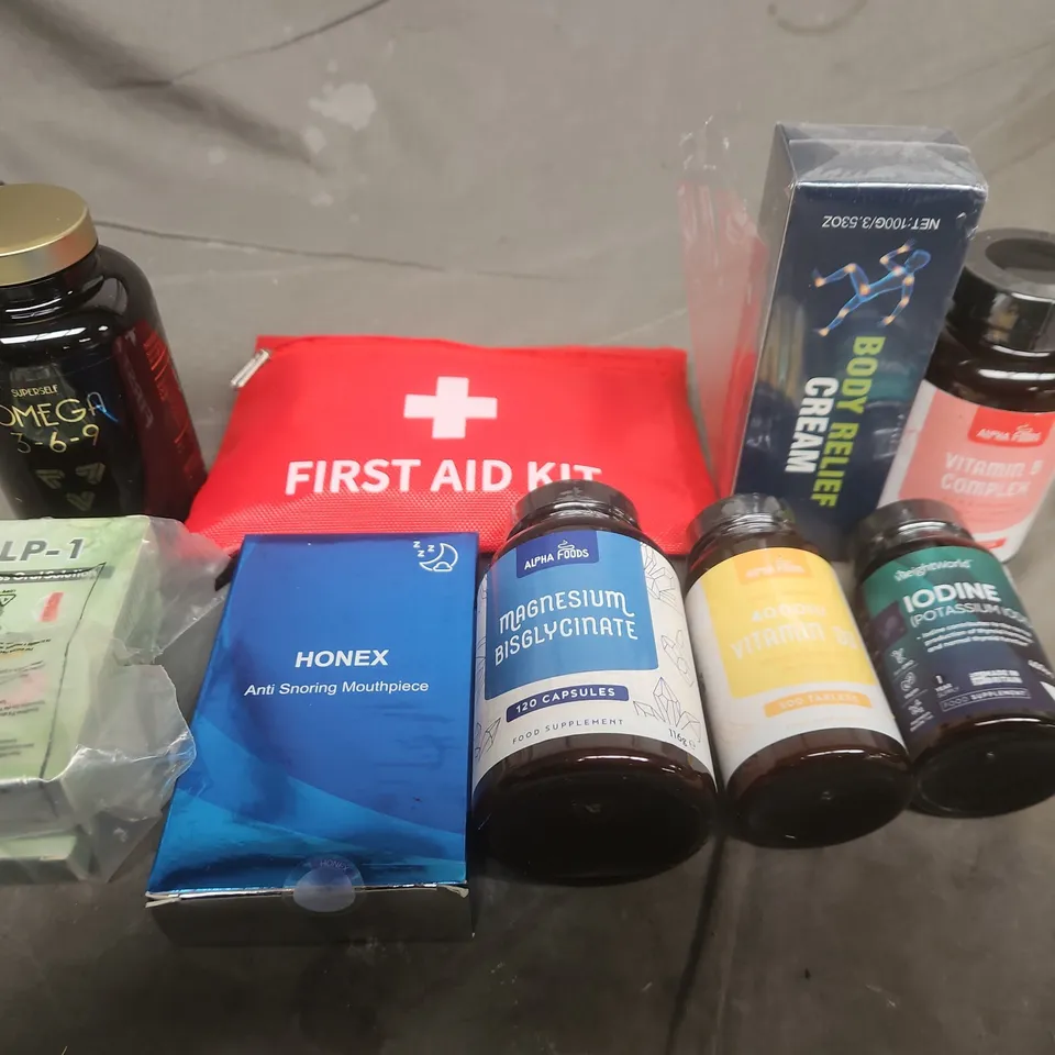 APPROXIMATELY 10 ASSORTED ITEMS TO INCLUDE FIRST AID KIT , OMEGA 3-6-9 AND ANTI SNORING MOUTHPIECE 