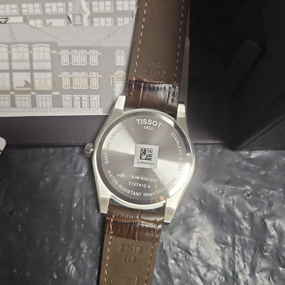 TISSOT GENTLEMAN WRISTWATCH – SILVER DIAL, BROWN LEATHER STRAP