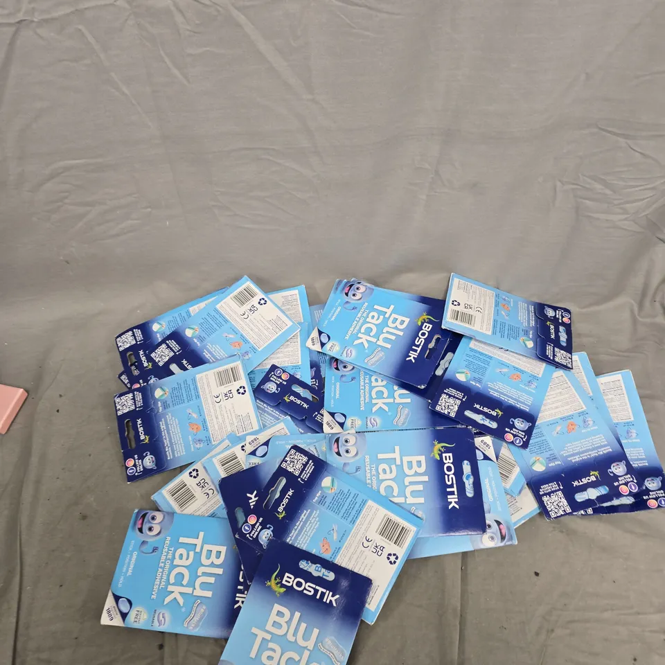 APPROXIMATELY 32 PACKETS OF BLU TACK