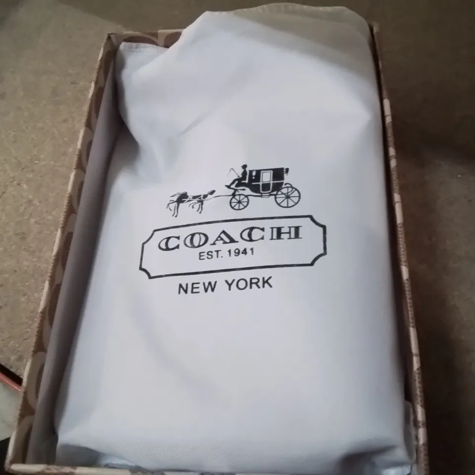 BOXED BLACK LEATHER COACH CLUTCH BAG
