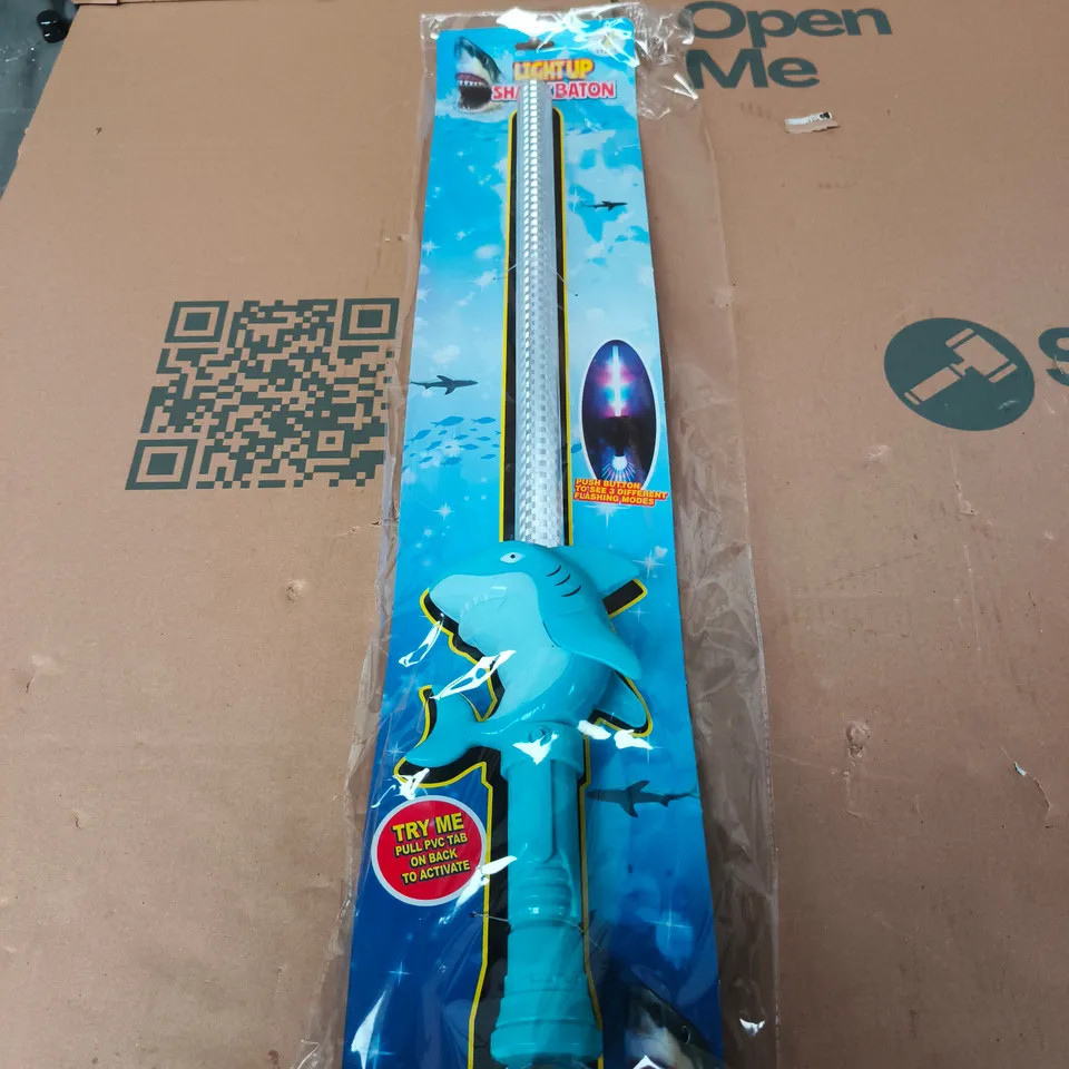 BOX OF APPRXIMATELY 20 LIGHT UP SHARK BATONS 