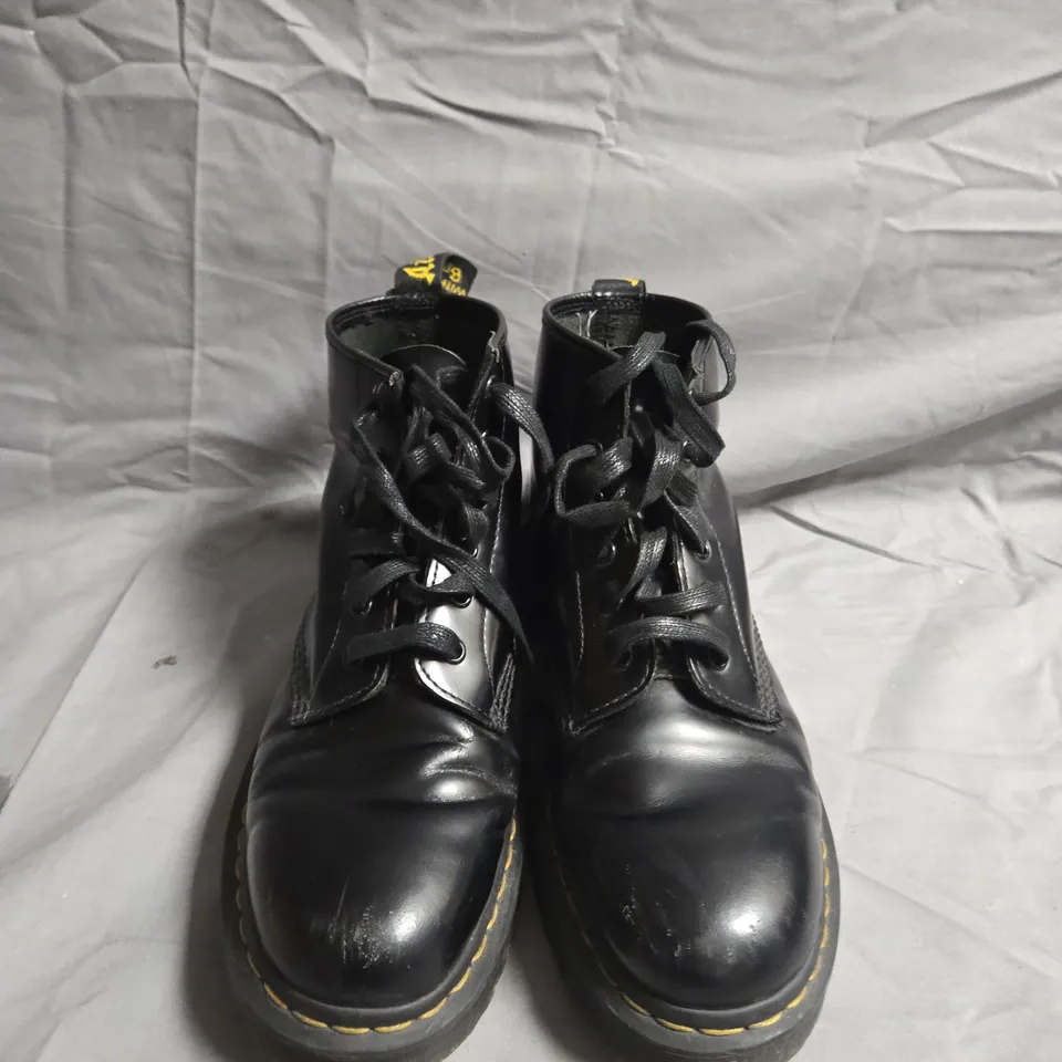 BOXED PAIR OF DR.MARTENS CAMO BOOTS - UK SIZE UNSPECIFIED