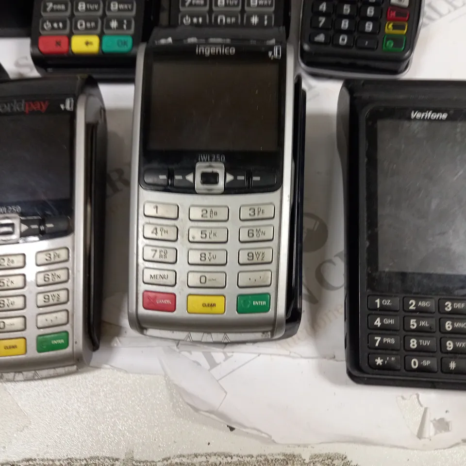 LOT OF 6 ASSORTED HANDHELD CARD TERMINALS TO INCLUDE INGENICO IWL250 AND CASTLES VEGA3000