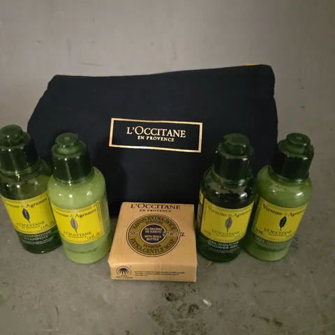 L,OCCITANE TRAVEL BAG INCLUDES SOAP, BODY MILK AND SHAMPOO