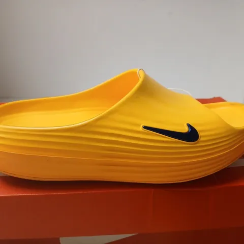 BOXED PAIR OF NIKE REACT X REJUVEN SLIDE β YELLOW, UK 8