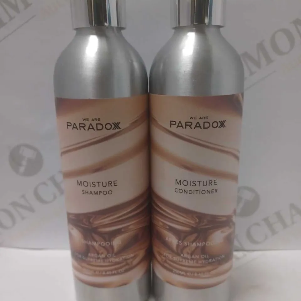 LOT OF 2 WE ARE PARADOXX PRODUCTS TO INCLUDE MOISTURE SHAMPOO & MOISTURE CONDITIONER 