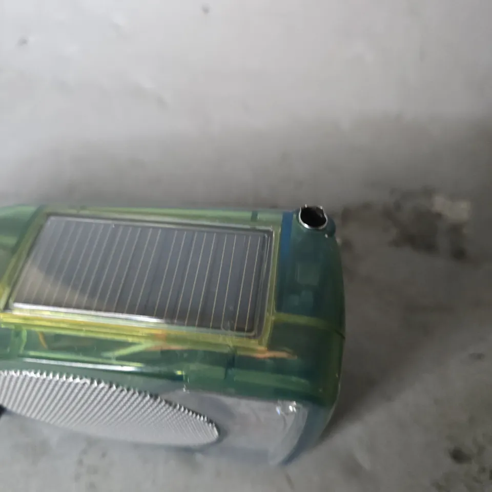 FREEPLAY DRIVEN PORTABLE WIND UP RADIO 