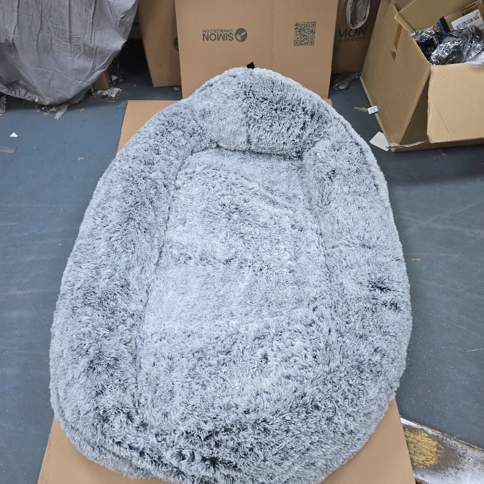 Grey plush dog bed