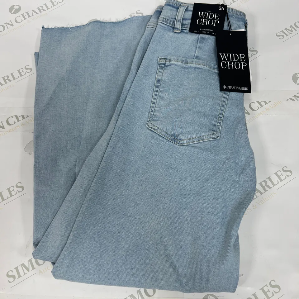 STRADIVARIUS WIDE CROP JEANS IN LIGHT BLUE SIZE 36