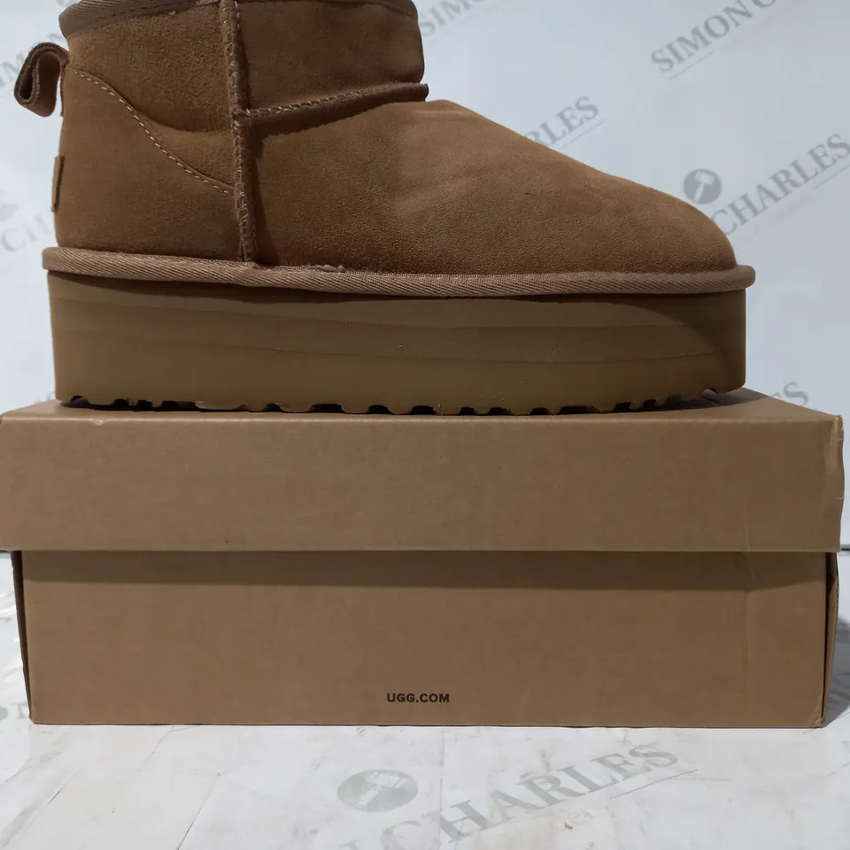 BOXED PAIR OF UGG FLEECE LINED PLATFORM SLIP-ON SHOES IN TAN UK SIZE 6.5