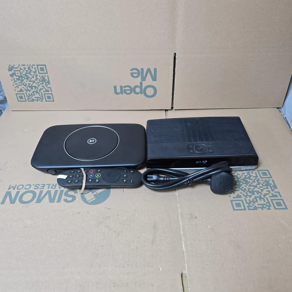 TOTE OF APPROXIMATELY 12 ASSORTED HOUSEHOLD ITEMS TO INCLUDE ROUTERS, CABLES, REMOTE CONTROL ETC