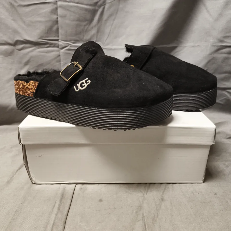 BOXED PAIR OF UGG FAUX FUR LINED MULES IN BLACK SIZE EU 39