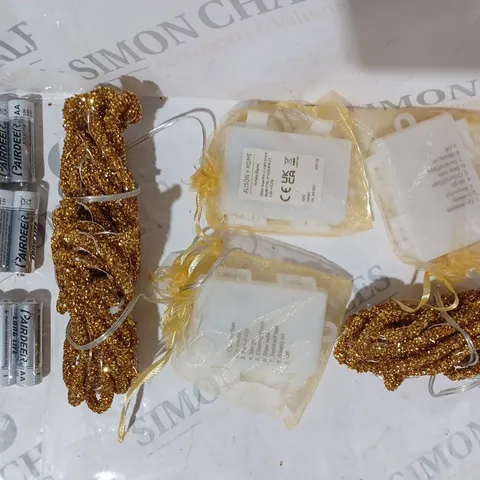 OUTLET ALISON CORK 2M INDOOR/OUTDOOR PRE-LIT GLITTER ROPE STRANDS IN GOLD COLOUR