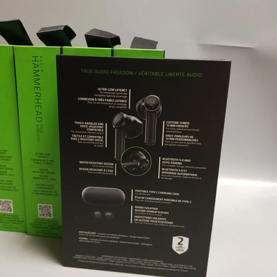 LOT OF 5 BOXED RAZER WIRELESS HEADPHONES IN BLACK AND GREEN INCLUDES CHARGING CASE, CABLE AND WRIST STRAP
