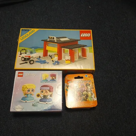 THREE ASSORTED LEGO PRODUCTS TO INCLUDE; 6369 LEGOLAND BOX, LEGO DISNEY FROZEN MINI-FIGURES BOX, AND LEGO MINIFIGURES 71052 PACK