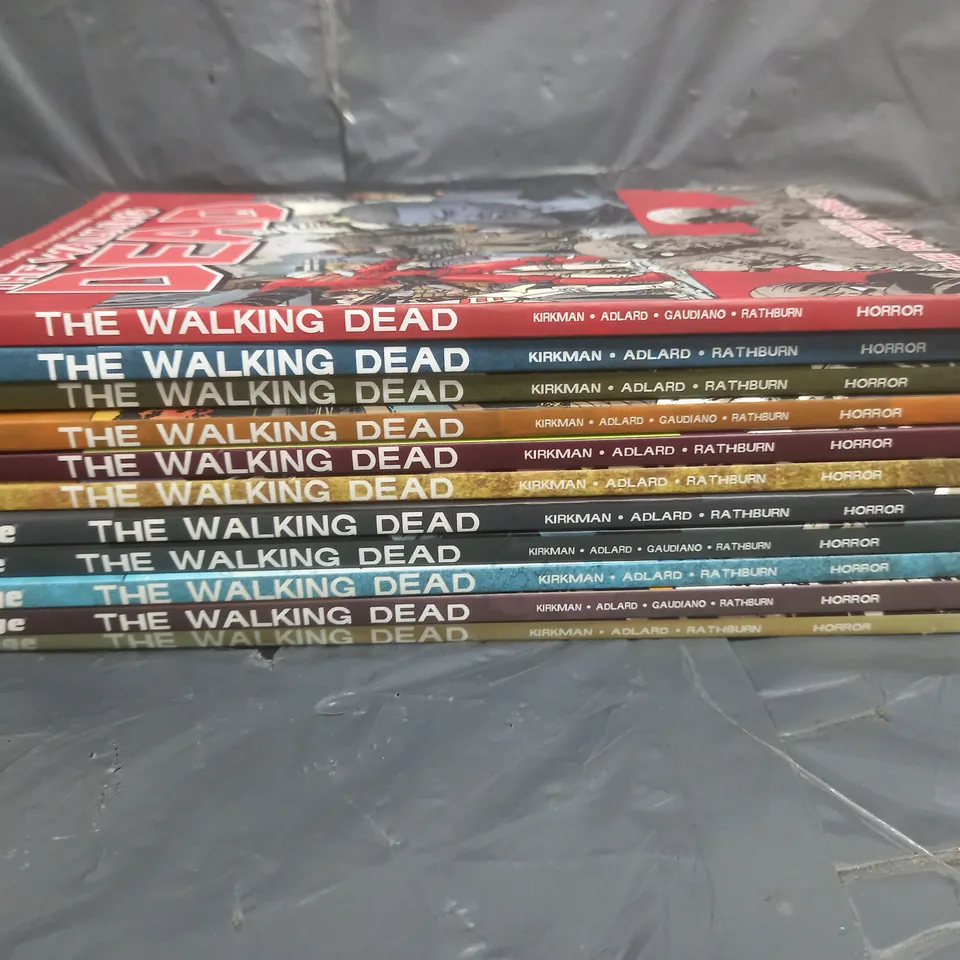 LOT OF 11 THE WALKING DEAD GRAPHIC NOVELS - VOLUMES 2/5/7/9/11/12/15/24/25/27/31