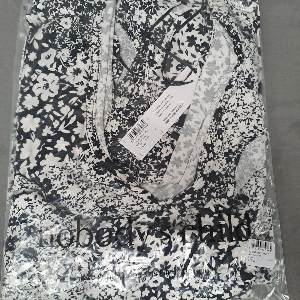 NOBODY'S CHILD SUKI JUMPSUIT IN WHITE/BLACK UK SIZE 14