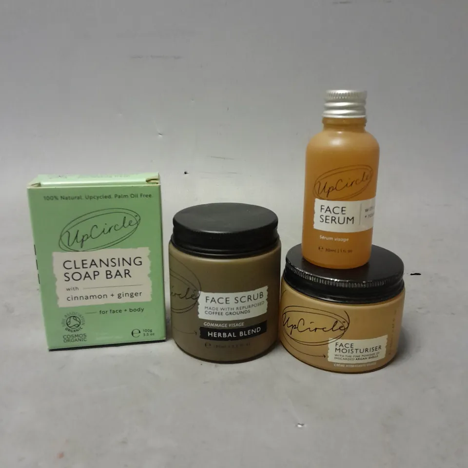 LOT OF 4 UPCIRCLE SKIN CARE PRODUCTS TO INCLUDE FACE SCRUB, SOAP BAR AND SERUM - COLLECTION ONLY - GLASS