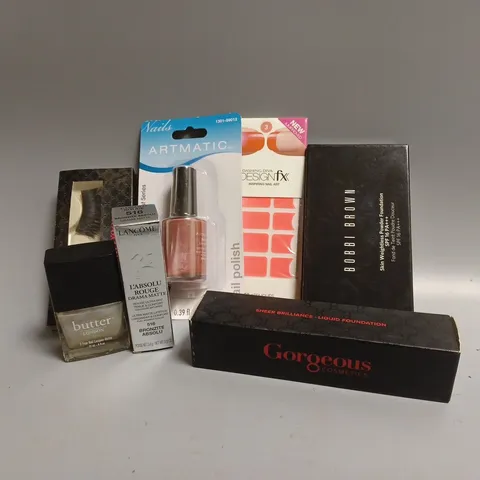 APPROXIMATELY 30 ASSORTED COSMETICS TO INCLUDE GORGEOUS LIQUID FOUNDATION, BOBBI BROWN POWDER FOUNDATION, LANCOME LIPSTICK, BUTTER NAIL LACQUER, DASHING DIVA NAIL ART
