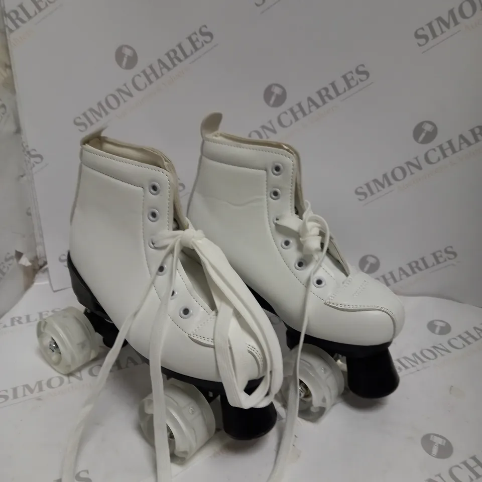 BOXED XUDREZ FOUR WHEEL ROLLER-SKATES - SIZE UNSPECIFIED 