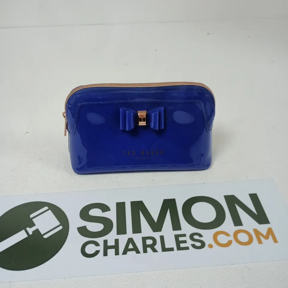 TED BAKER BLUE PATENT BOW CLUTCH WALLET