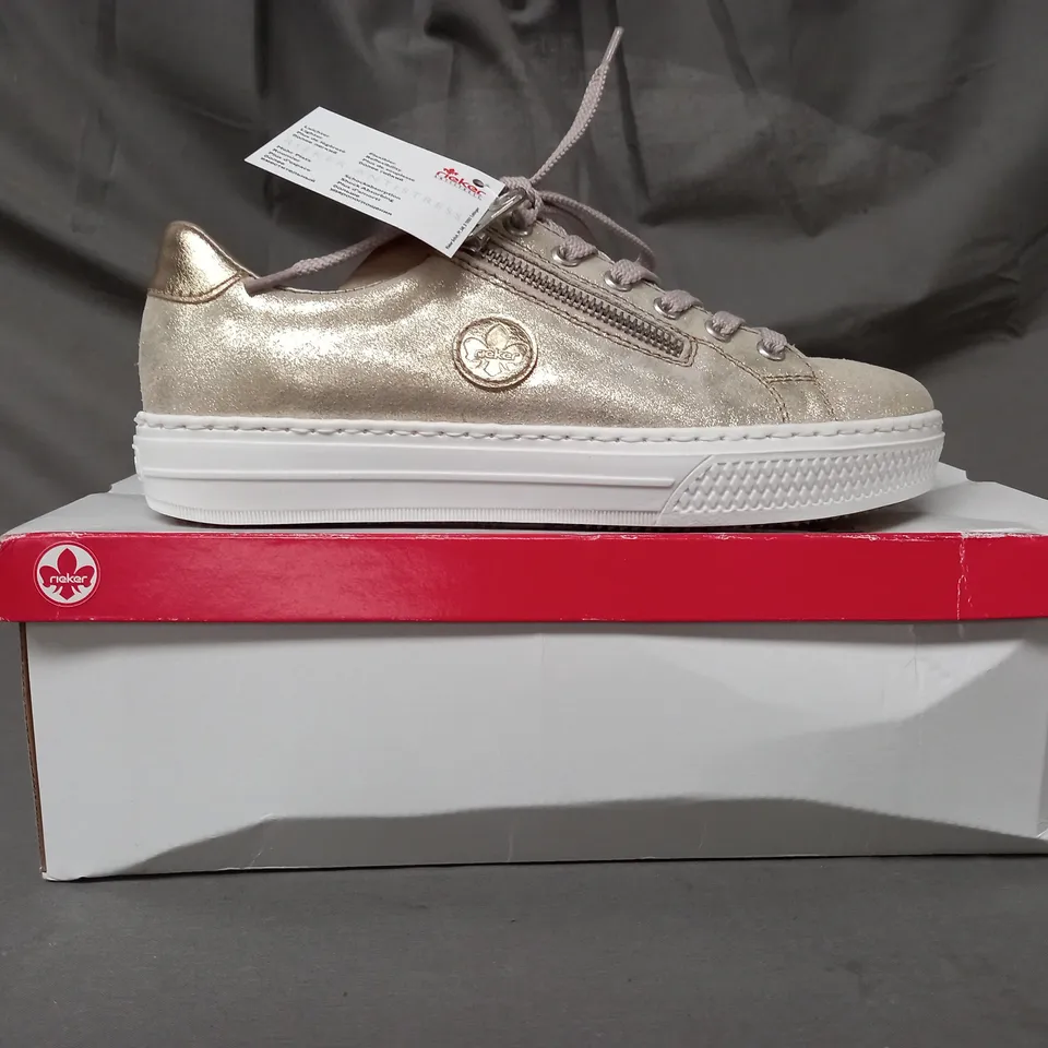 BOXED PAIR OF RIEKER TRAINERS IN METALLIC GOLD SIZE 5