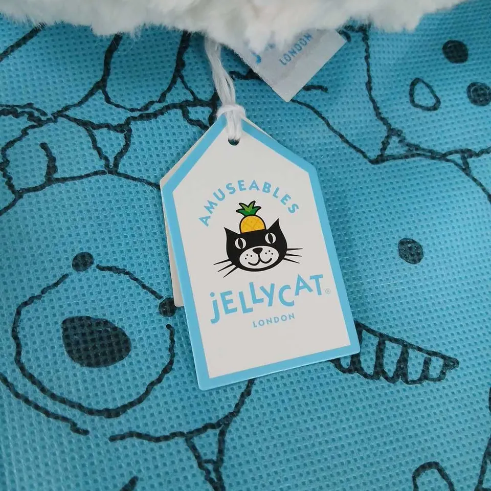 JELLYCAT AMUSEABLES MOON PLUSH – CREAM MOON ON BLUE PATTERNED CUSHION