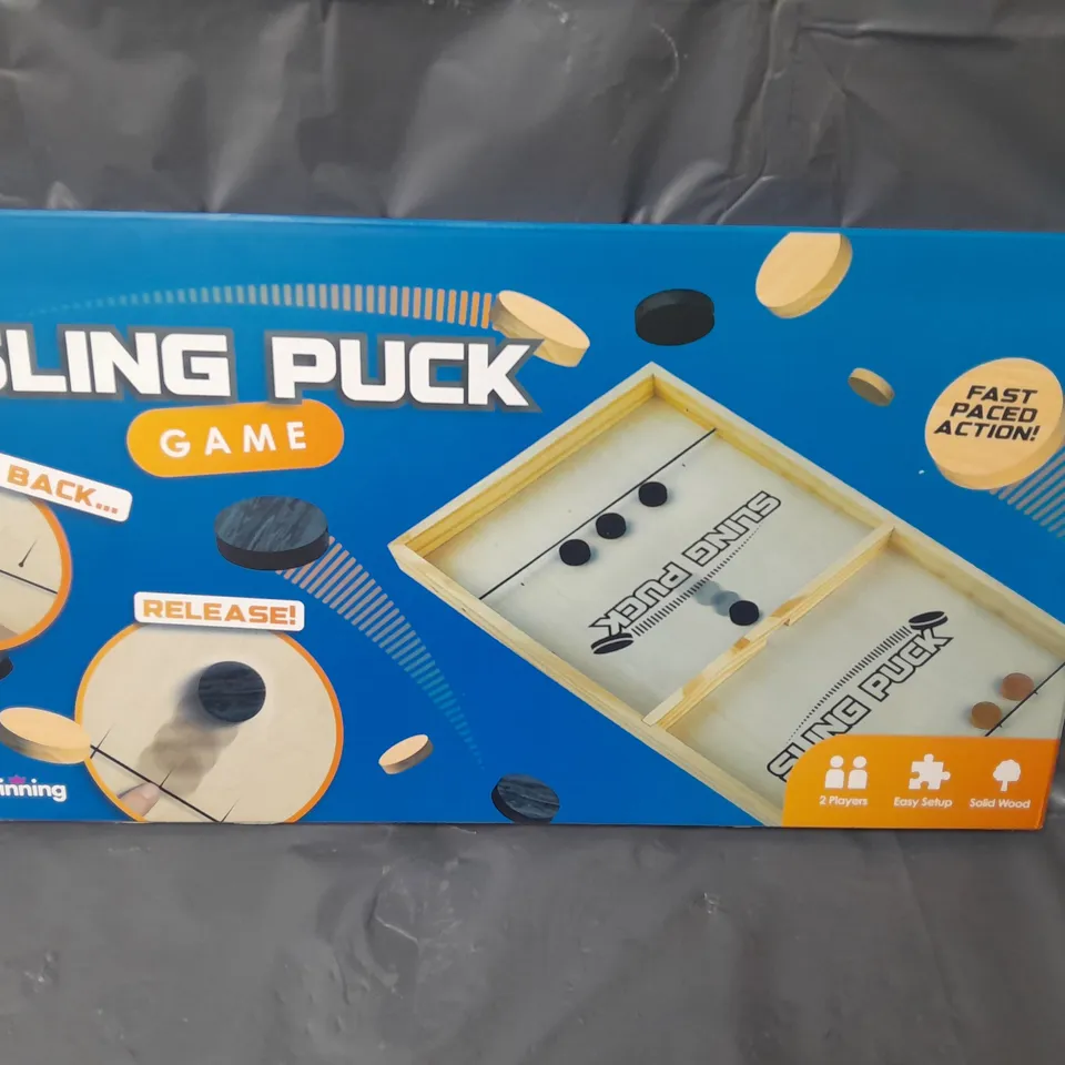 BOXED SLING PUCK GAME