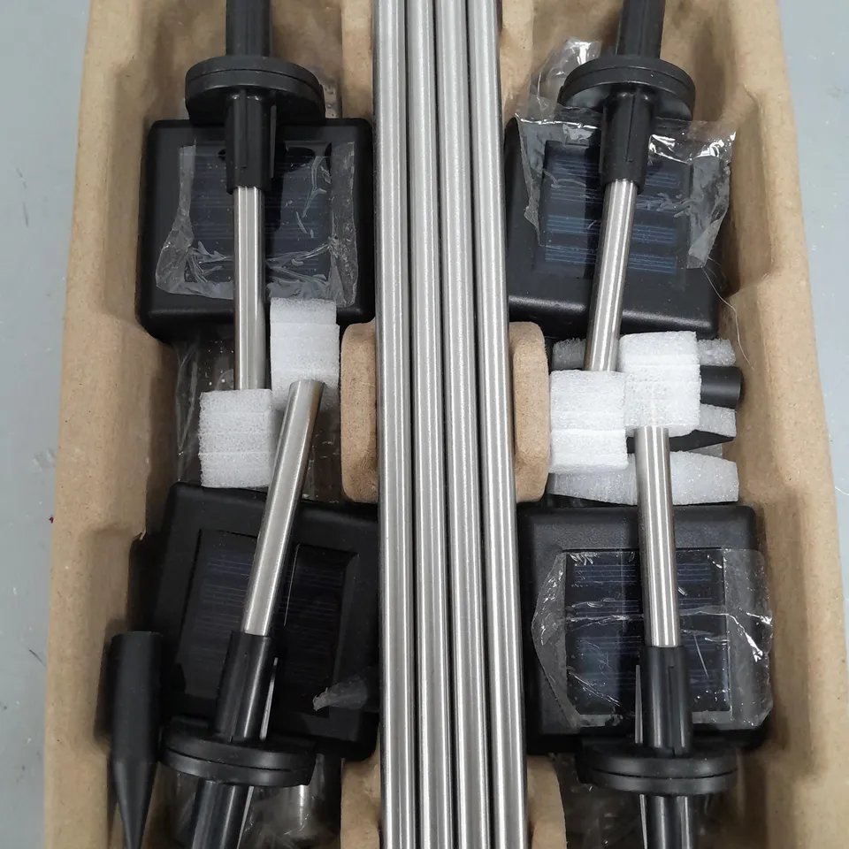 BOXED BELL & HOWELL GLIMMER STICKS SET OF 4 SOLAR PATHWAY LIGHTS