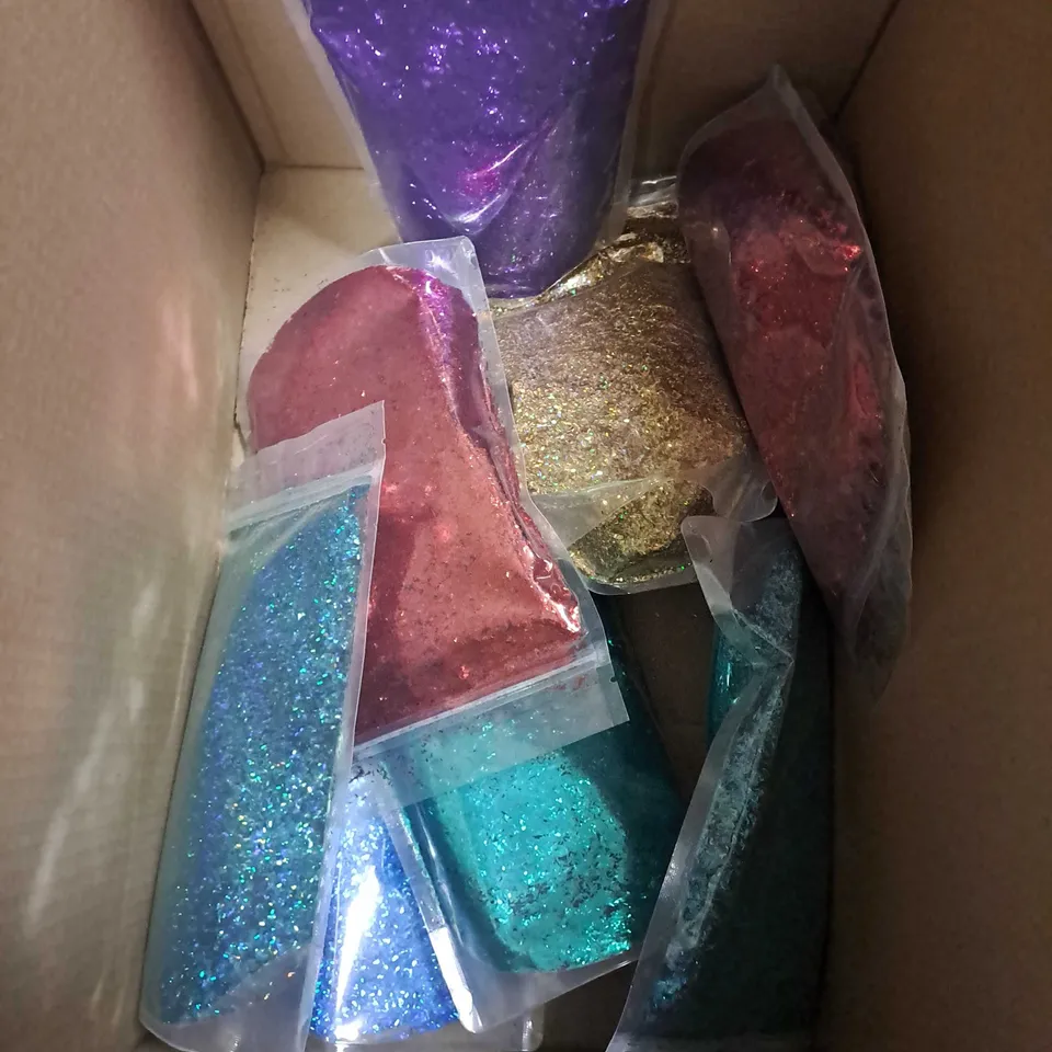 BOX OF APPROXIMATELY 15 SEALED ASSORTED GLITTER POUCHES TO INCLUDE - PURPLE - GOLD - RED - ETC - COLLECTION ONLY