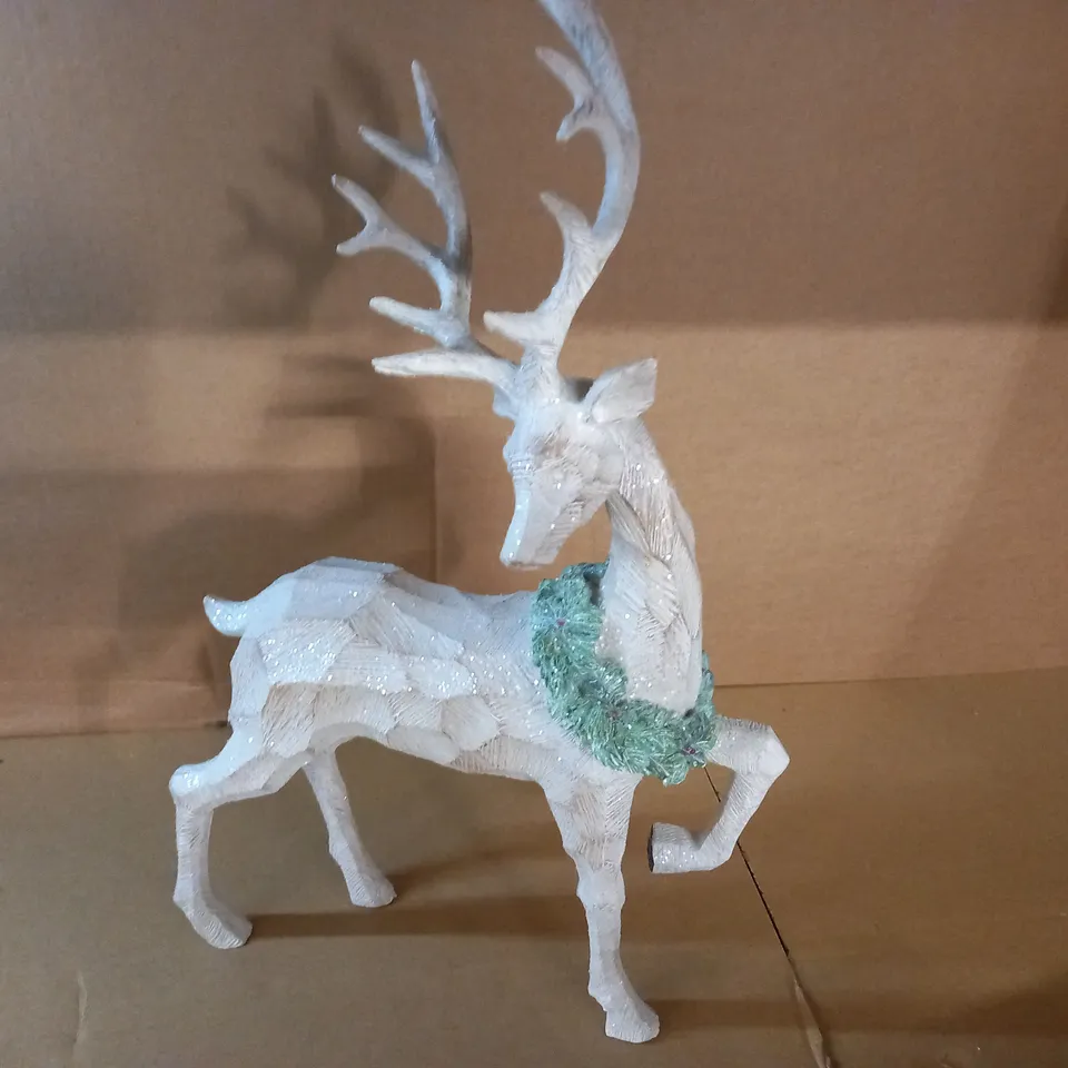 REINDEER CARVED ORNAMENT