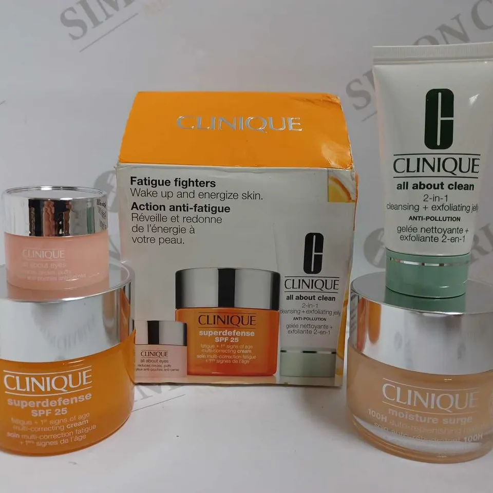 BOX OF 2 CLINIQUE ITEMS TO INCLUDE MOISTURE SURGE AND FATIGUE FIGHTERS GIFT SET