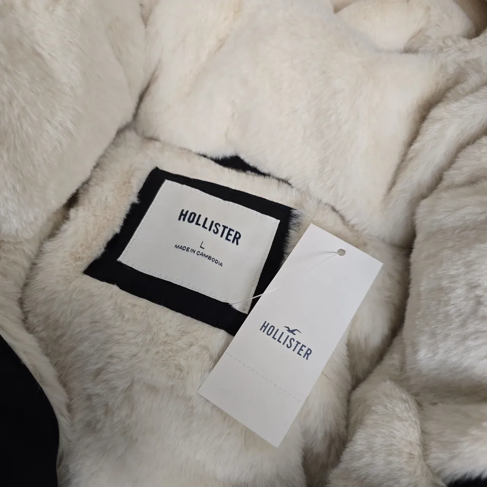 HOLLISTER HOODED PUFFER JACKET – BLACK WITH CREAM FAUX-FUR LINING, SIZE L
