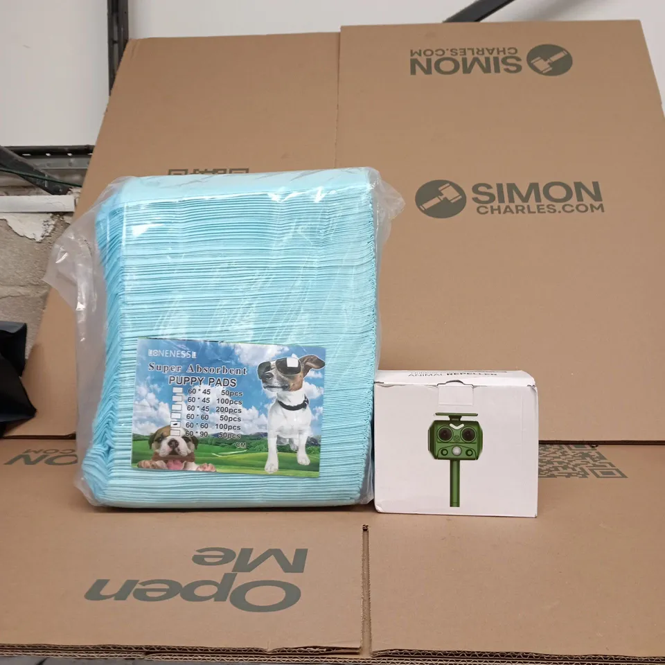 CAGE OF APPROXIMATELY 20 ASSORTED ITEMS INCLUDING OUTDOOR SOLAR ANIMAL REPELLENT AND LONENESS PUPPY PADS