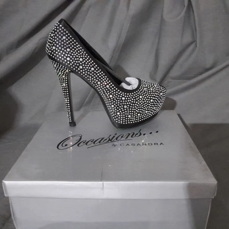 APPROXIMATELY 10 BOXED PAIRS OF COLOURED GEM PLATFORM HIGH HEELS