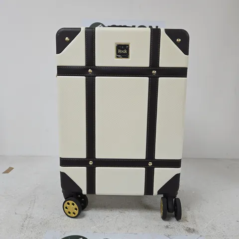ROCK LUGGAGE HARD-SHELL SUITCASE β CREAM WITH BLACK CROSS STRAPS, FOUR WHEELS