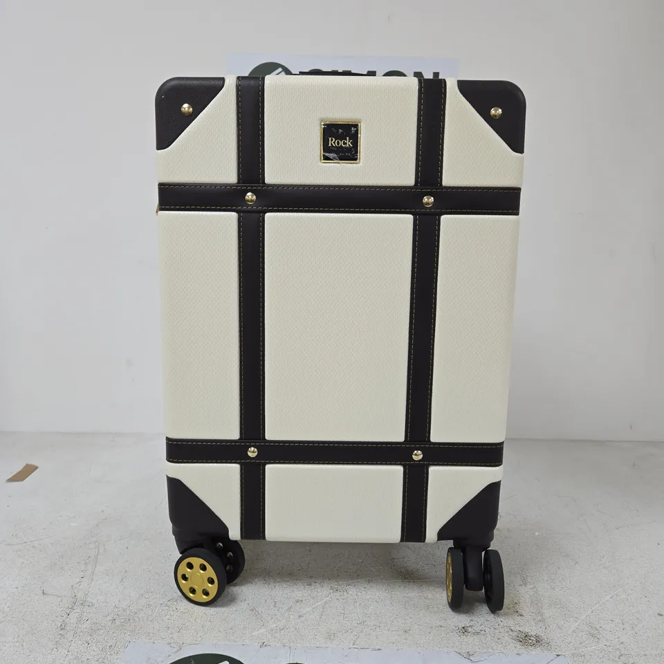 ROCK LUGGAGE HARD-SHELL SUITCASE – CREAM WITH BLACK CROSS STRAPS, FOUR WHEELS