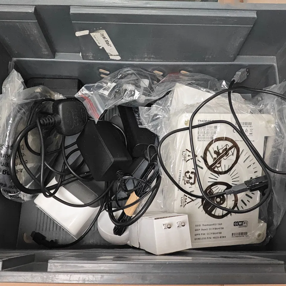 LOT OF ASSORTED TECH ITEMS TO INCLUDE REMOTES,ETHERNET CABLE AND POWER ADAPTER