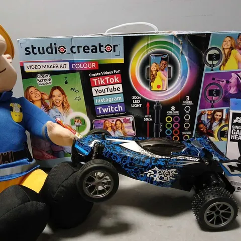 BOX APPROXIMATELY 7 ASSORTED ITEMS TO INCLUDE - STUDIO CREATOR , NO FEAR HEADSET , FIREMAN SAM PLUSH ETC