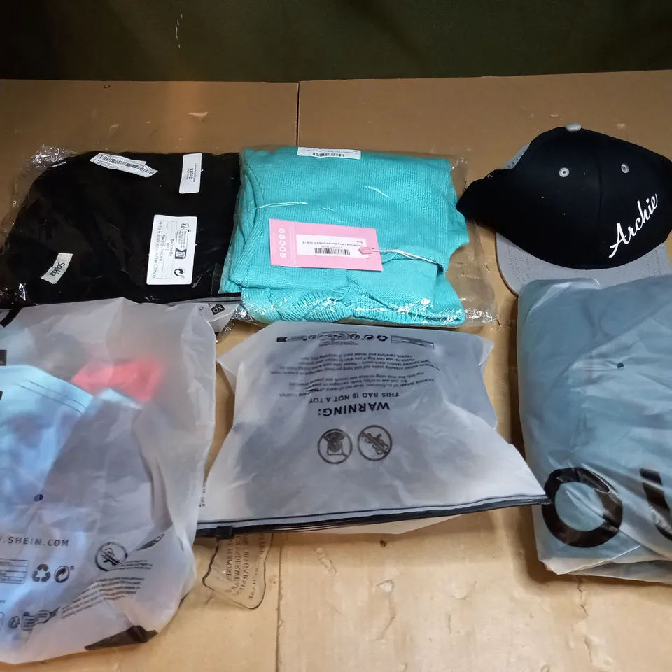 LARGE BOX OF ASSORTED CLOTHING ITEMS TOO INCLUDE TOPS , DRESSES AND PANTS ALL IN VARIOUS SIZES AND COLOURS 