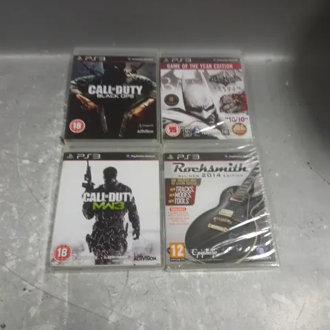 FOUR ASSORTED SONY PLAYSTATION THREE GAMES TO INCLUDE; BATMAN ARKHAM CITY, CALL OF DUTY BLACK OPS, CALL OF DUTY MW3 AND ROCKSMITH ALL NEW 2014 EDITION