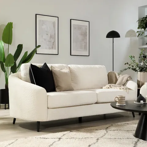 BOXED MAE CURVED 3 SEATER SOFA, IVORY BOUCLE FABRIC (1 BOX)