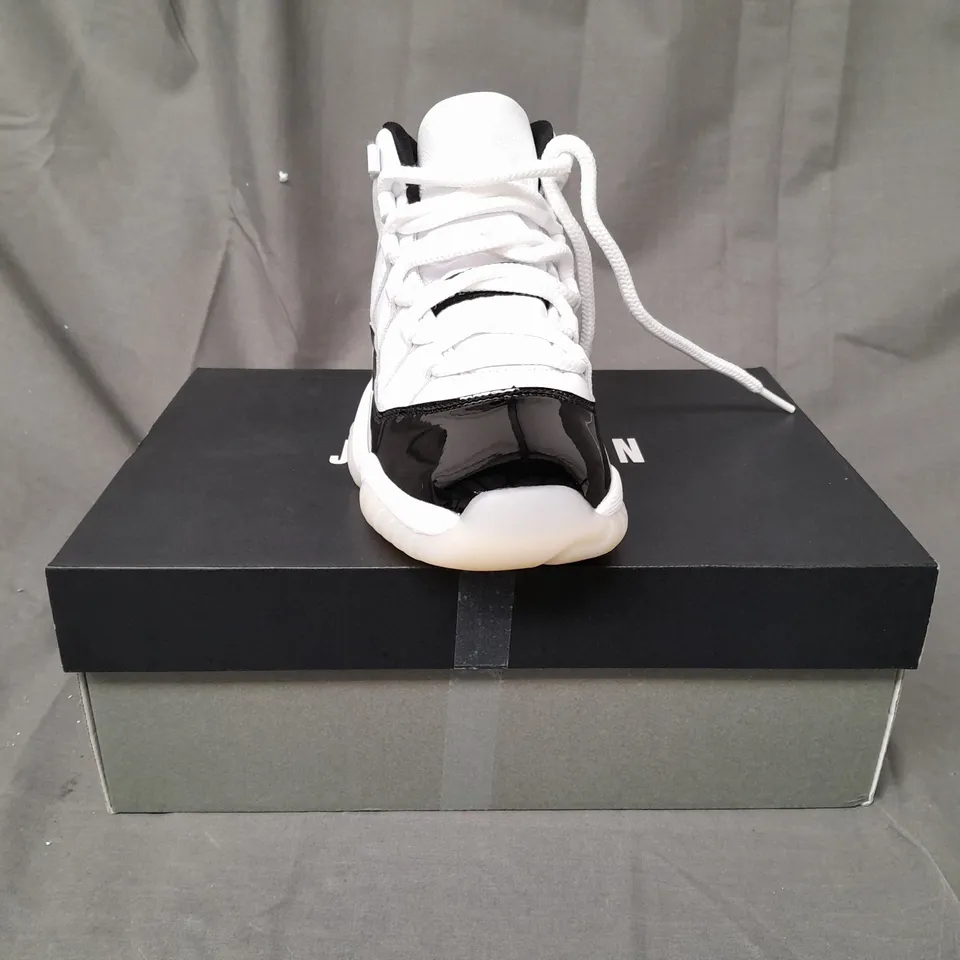 BOXED PAIR OF NIKE AIR JORDAN 11 RETRO SHOES IN WHITE/BLACK UK SIZE 4